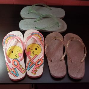 Children place girl flip flops
